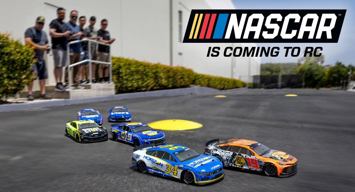Losi 1/12 Nascar race cars lined up on a track.